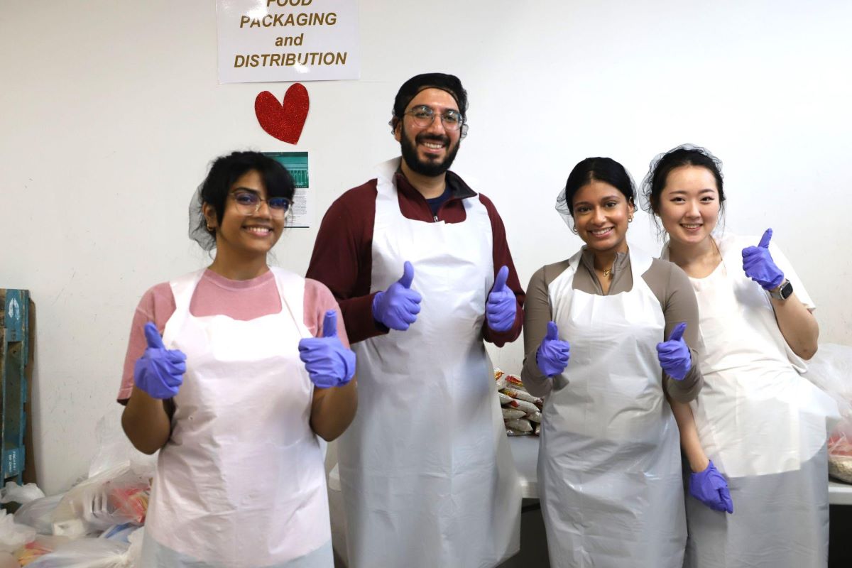 Standard Chartered Bank Volunteers Give Back to the Flushing Community at SACSS Food Pantry